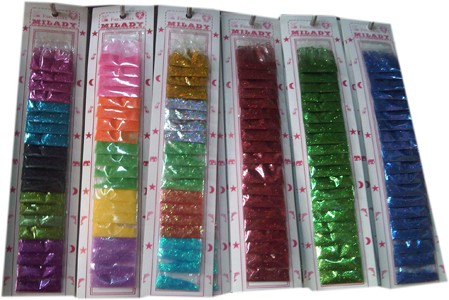 Sobres de escarchas, lentejuelas, etc. $100